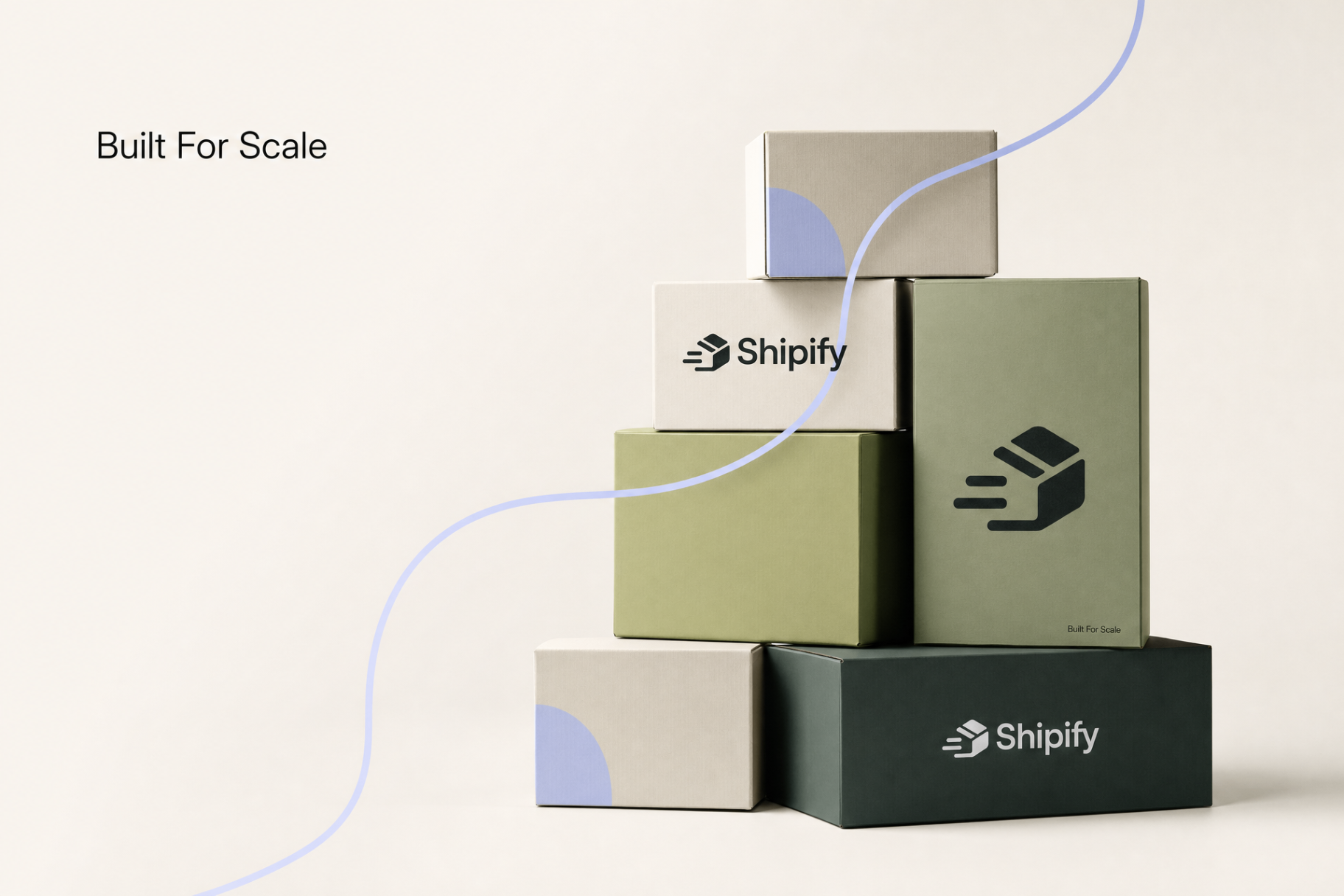 Stacked Shipify branded boxes representing operational scale